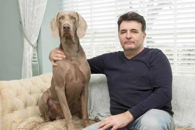 Dean Jenkinson and his Weimeraner Seth, appealing for the return of his other dog Jasmine who has been missing for 4 weeks
