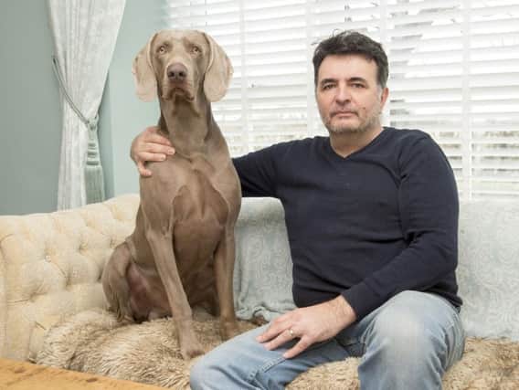 Dean Jenkinson and his Weimeraner Seth, appealing for the return of his other dog Jasmine who has been missing for 4 weeks