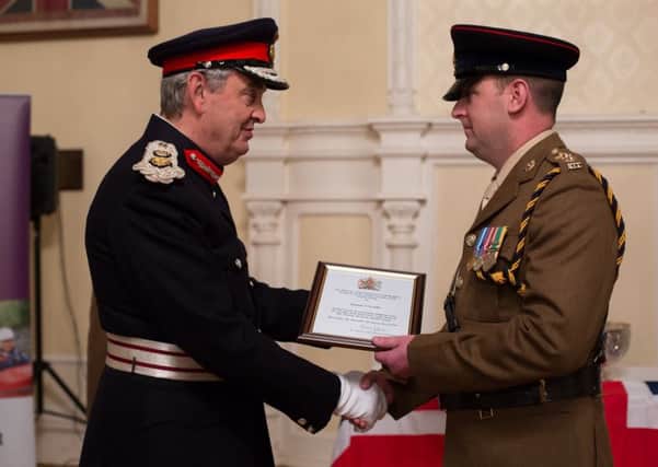 Capt Kevin Costello receives his award from HM Lord-Lieutenant of South Yorkshire, Andrew Coombe Esq