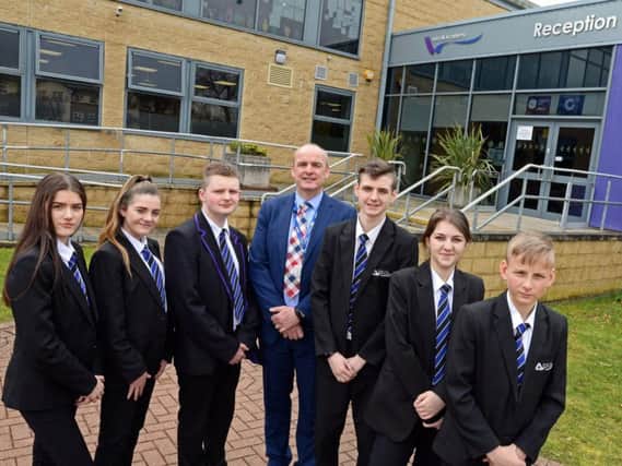 Ash Hill Academy Principal John Higgins, pictured with some of his pupils. Picture: Marie Caley NDFP Ash Hill MC 1