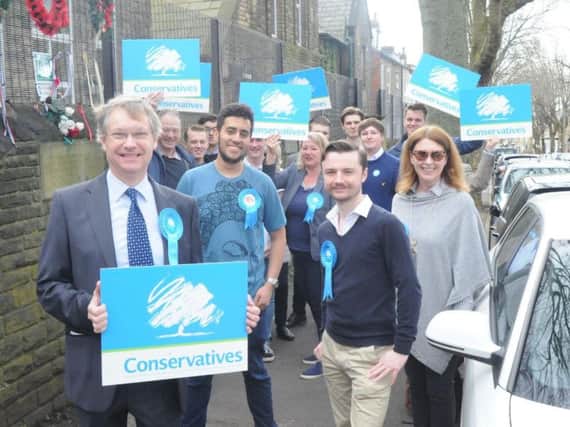 Ian Walker and fellow Conservative activists along Western Road in Crookes. Picture: George Torr