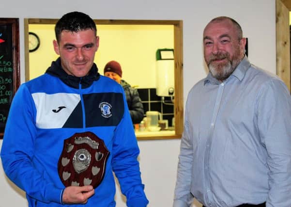 Steve Garner, left, receives his Supporters Player of the Year award from Armthorpe Welfare chairman Lee Carmody.