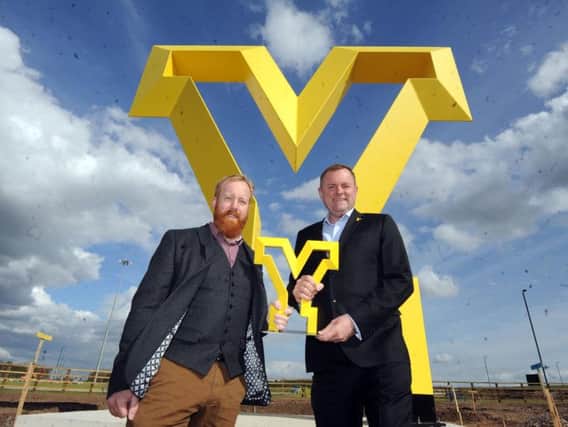 26 April 2018....Sir Gary Verity and artist Chris Brammall unveil a new piece of land art/scupture in Doncaster. Picture Scott Merrylees