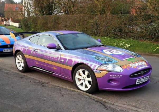 The colour purple is a winner for Bluebell Wood and Retfords Stuart Dixon, because his branded car is helping to raise valuable funds for the childrens hospice.