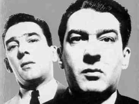 Reggie and Ronnie Kray.