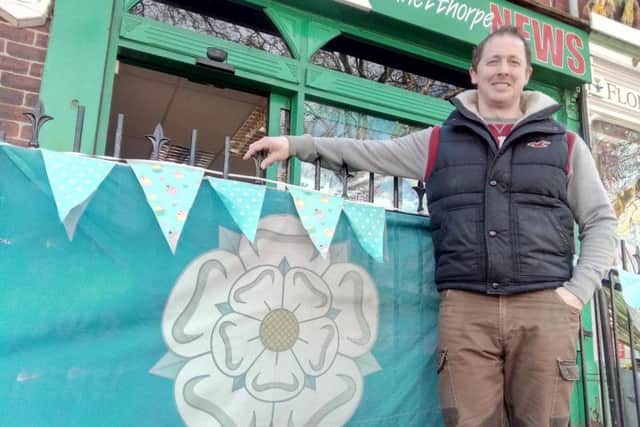 Andy Fergie, outside his Bennetthorpe News shop near the Doncaster finish of the Tour de Yorkshire