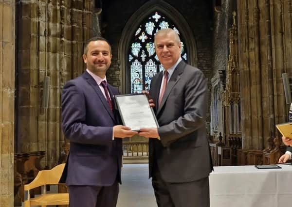 Firas Jabar receiving the Duke of York Community Initiative Award on behalf of City of Sanctuary Sheffield