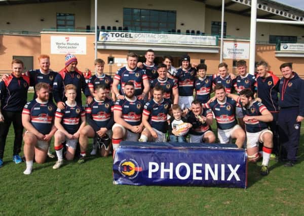 Ethan Germain is pictured with the Doncaster Phoenix team.