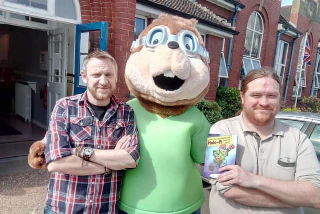 Rob Smedley, Mole R, and Ben Bonser, at the Hill Top Centre in Edlington. Community volunteer and artist Ben created the character being used in a health campaign
