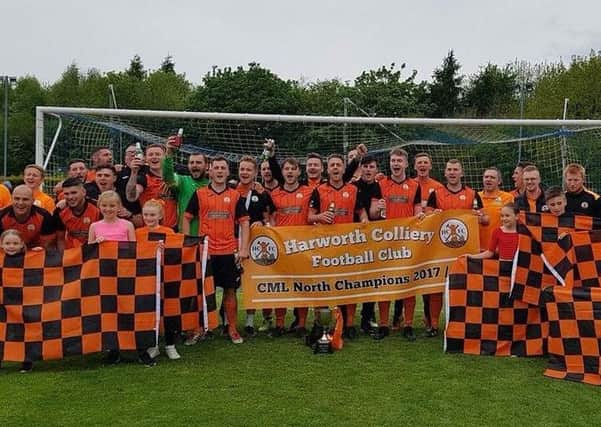 Harworth Colliery celebrate winning the Central Midlands League North Division title.