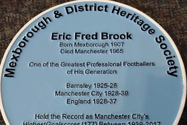The plaque to Eric Brook.