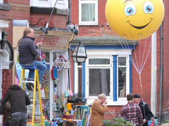 David Jason, Tim Healy and James Baxter film Still Open All Hours with a gigantic balloon in Balby. (Photo: Tony Critchley).