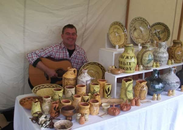 Epworth Community Fair at the Old Rectory. Sean from Whisker Hill Potteries, (pictured), provided music and pots.