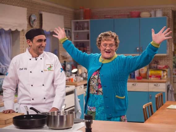 Aly Mahmoud with Mrs Brown star Brendan O'Carroll.