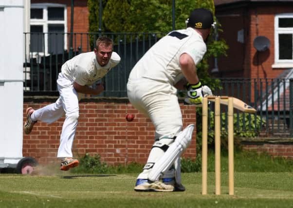 Sprotbrough's Charlie Kaye bowls against Houghton Main.