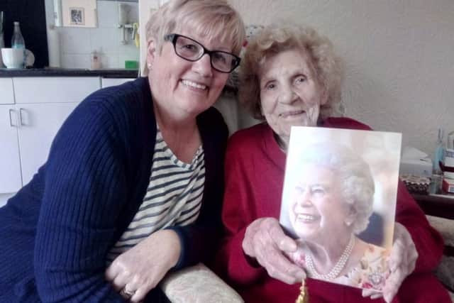 Winifred Espin, of Rossington, has celebrated her 100th birthday. She is pictured with daughter Jean Jones