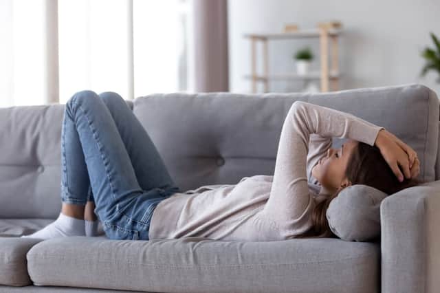Some people who are struggling with the condition have reported symptoms of breathlessness, muscle aches and severe fatigue, among others (Photo: Shutterstock)